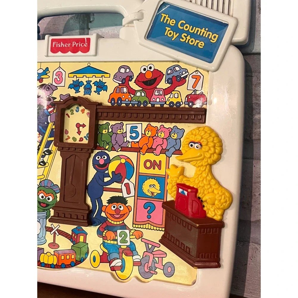 Vintage Fisher-Price Talk'n Teach Tag Along Sesame Street The Counting Toy Store